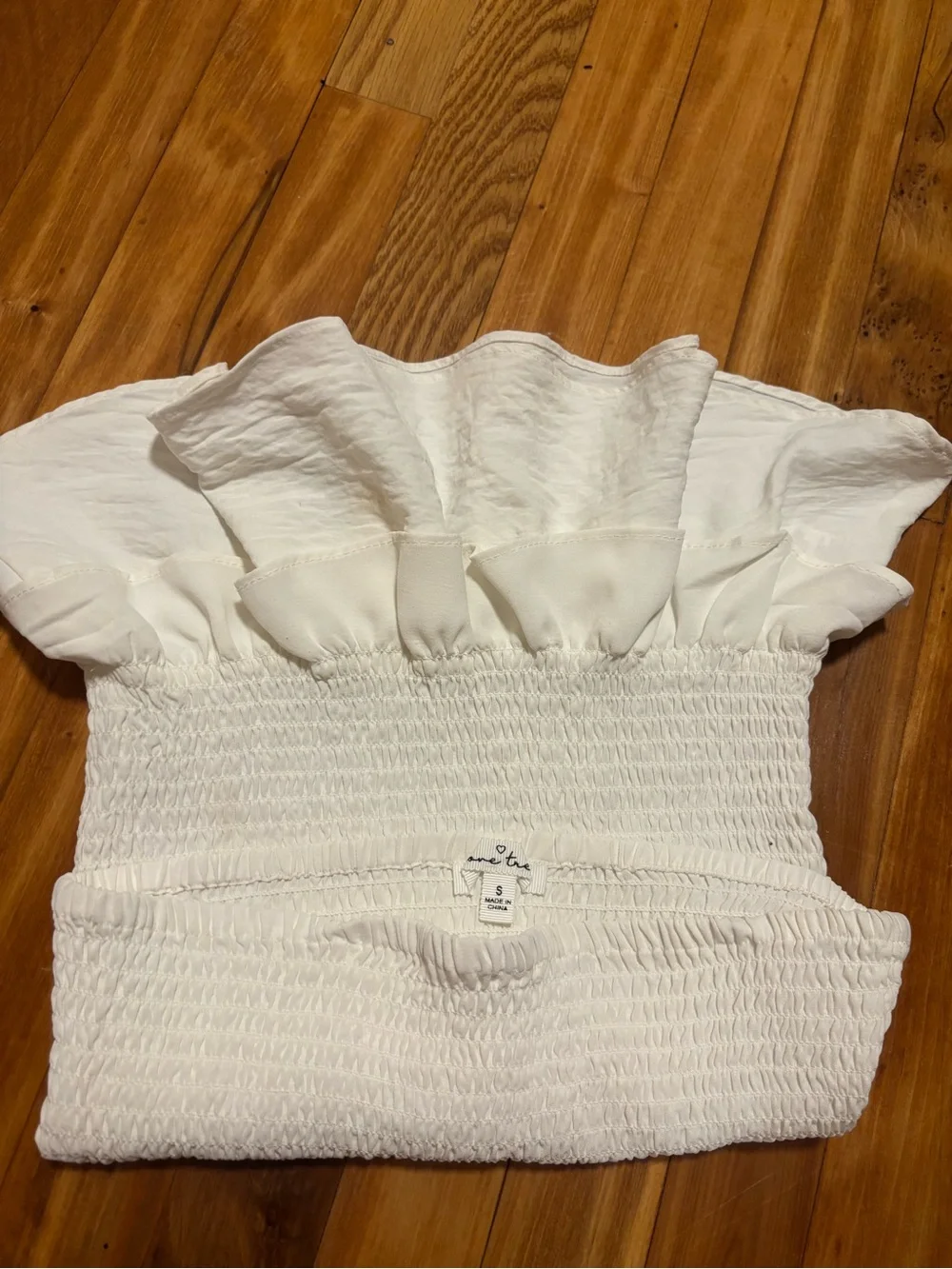 White Smocked Ruffled Peplum Skirt